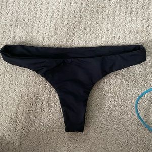Black thong swim bottom
